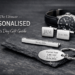 Flat‑lay of four personalised Father’s Day gifts on a light stone surface: an engraved silver money clip reading ‘For all you do.’, a stainless steel guitar pick engraved ‘You rock, Dad.’ beside a brown leather pouch, a silver bookmark engraved ‘Dad’s quiet time.’ resting on an open book, and an open silver pocket watch with the inscription ‘Time well spent with you.’ inside the lid.”Flat‑lay of four personalised Father’s Day gifts on a light stone surface: an engraved silver money clip reading ‘For all you do.’, a stainless steel guitar pick engraved ‘You rock, Dad.’ beside a brown leather pouch, a silver bookmark engraved ‘Dad’s quiet time.’ resting on an open book, and an open silver pocket watch with the inscription ‘Time well spent with you.’ inside the lid.”